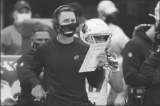  ?? ASSOCIATED PRESS ?? ARIZONA CARDINALS HEAD COACH KLIFF KINGSBURY works the sidelines during the second half of a game against the New York Jets last Sunday in East Rutherford, N.J.