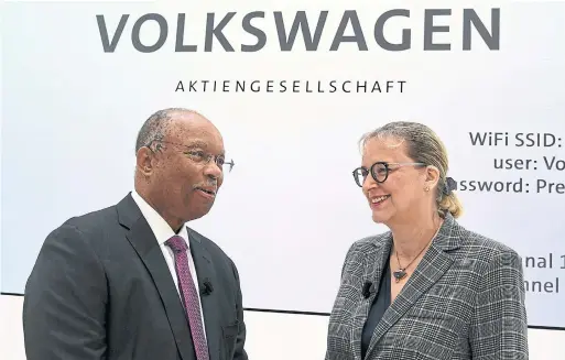  ?? HOLGER HOLLEMANN THE ASSOCIATED PRESS ?? Larry Thompson, the U.S. independen­t corporate monitor, and Hiltrud D. Werner, a VW board member, said the automaker pledged to be more open in the future.
