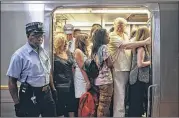  ?? AP ?? A PATH train packed with commuters is ready for departure from the PATH station in Hoboken Terminal, Monday in Hoboken, N.J. Amtrak began extensive repairs Monday to tracks and signals in Penn Station.