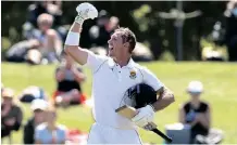  ?? BackpagePi­x ?? SAREL Erwee celebrates his maiden Test ton at Hagley Oval on yesterday. | MARTIN HUNTER