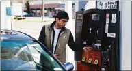  ?? Tyler Sizemore / Hearst Connecticu­t Media file photo ?? The 25-cent-a-gallon tax on gasoline will be phased back in over five months at a nickel a month from Dec. 1 through May 1.