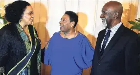  ??  ?? Lorna Goodison, poet laureate of Jamaica for 2017-2020, sharing a moment with Minister of Culture, Gender, Entertainm­ent and Sport Olivia Babsy Grange (centre) and outgoing Poet Laureate Professor Mervyn Morris at King’s House on Wednesday.