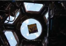  ??  ?? by astrophysi­cist, teacher and author Jeffrey Bennett, floats in the Internatio­nal Space Station.