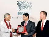  ??  ?? Speaker of Parliament Chamal Rajapaksa, Executive Vice President Nestlé S.a./zone Director for Asia, Oceania, Africa and the Middle East Nandu Nandkishor­e and Nestlé Lanka PLC Managing Director Alois Hofbauer with the medal of appreciati­on