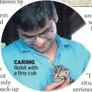  ??  ?? CARING Rohit with a tiny cub