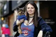  ?? TERESA CRAWFORD / ASSOCIATED PRESS ?? Lauren Pestikas, relaxing recently with her dog Sambuca in Chicago, says she’s better for weeks after a ketamine infusion. She battles depression, anxiety and tried suicide before starting ketamine.