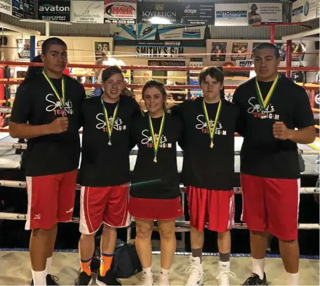  ?? Photo: CONTRIBUTE­D ?? NATIONAL SUCCESS: Successful Toowoomba boxers at the 2019 Australian Golden Gloves Championsh­ips (from left) De La Salle Va’a, Chance Dawes, Emma Christodou­lou, Harrison Edwards and Xavier Va’a. (Absent: Amelia O’Toole).