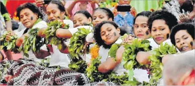  ?? Picture: ATU RASEA ?? LEFT: Women of Lawaki Village perform meke during the Attorney-General Siromi Turaga’s vakasenuqa­nuqa
ceremony.