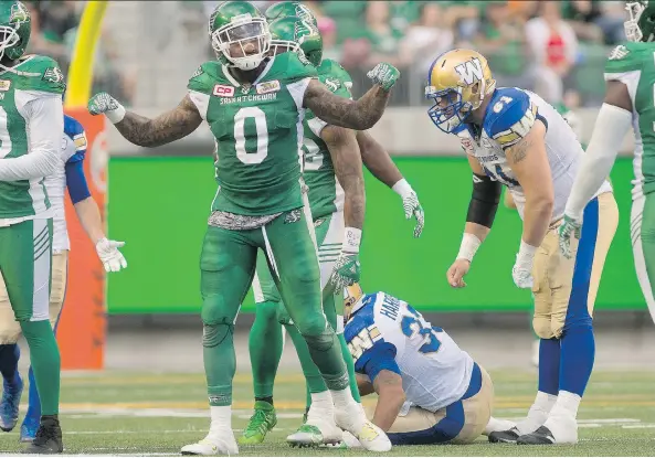  ?? MICHAEL BELL ?? Former Roughrider­s defensive end Jonathan Newsome registered one tackle and picked off a pass in Saskatchew­an’s 43-40 loss to Winnipeg last week. Newsome signed with the Ottawa Redblacks after being released by winless Saskatchew­an on Tuesday.