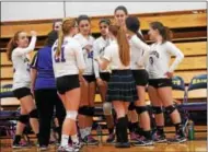  ?? BY NICK TOPPING- NTOPPING@DIGITALFIR­STMEDIA.COM ?? Saratoga Catholic coach Maria Izzo talks to her team between the first and second set during their 3-0 win over Taconic hills in the Section II Class C playoffs.