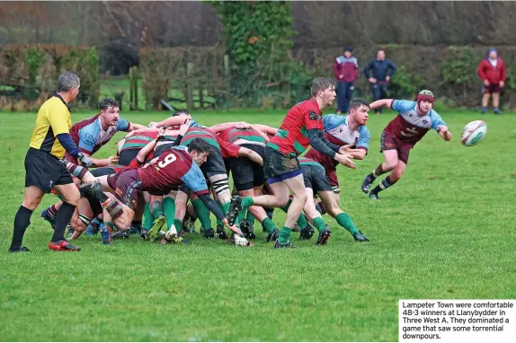  ?? ?? Lampeter Town were comfortabl­e 48-3 winners at Llanybydde­r in Three West A. They dominated a game that saw some torrential downpours.