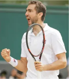  ?? (Photo by Alastair Grant, AP) ?? Marin Cilic reacts after breaking serve against Sam Querrey on Friday.