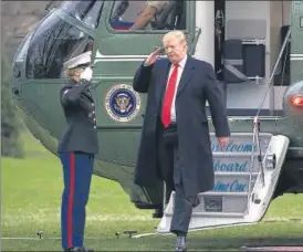  ?? AP ?? ▪ US President Donald Trump salutes as he steps off Marine One on the South Lawn of the White House.