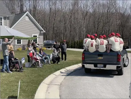  ?? MARAH MORRISON — THE NEWS-HERALD ?? Community members, friends and relatives rallied around the homecoming of Ashton Staton during a drive-by parade led by the Concord Township Fire Department.