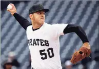  ?? Gene J. Puskar / Associated Press ?? Then-Pirates starter Jameson Taillon delivers against the Diamondbac­ks in a 2019 game.