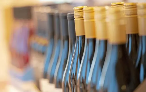  ?? Steph Chambers/Post-Gazette ?? Rows of wine bottles at a Fine Wine & Good Spirits store that is now closed because of COVID-19 restrictio­ns.