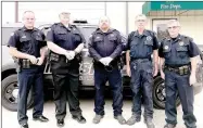  ?? SALLY CARROLL/MCDONALD COUNTY PRESS ?? The Pineville Marshal’s Office staff includes, from left, Levi Martin, Wes McDaniel, Sgt. Chris Pierce, Gary Huff and Captain Bill Rataczak. Not pictured: City Marshal Chris Owens, Ashley Boyd, Jimmy Armstrong, Jon Chandler, Chris Allison, David...