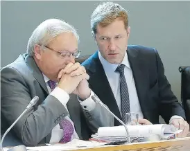  ?? BRUNO FAHY / AFP / GETTY IMAGES ?? Paul Magnette, right, prime minister of the Belgian region of Wallonia, speaks with parliament­ary chairman Andre Antoine, Friday. Magnette told reporters he was open to further discussion­s on CETA, but said Walloons need more time to review the file.