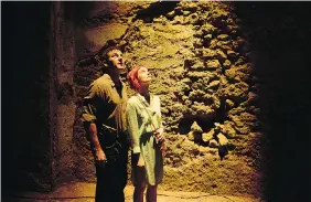  ?? RONEN AKERMAN/Showcase
Jason Isaacs, left, and Alison Sudol in Dig, which mixes political and religious elements. ??