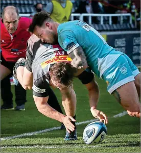  ??  ?? DOUBLE TROUBLE: Will Evans got two of Harlequins’ eight tries yesterday