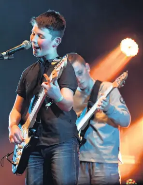  ?? PHOTO: PETER MCINTOSH ?? Rocking it . . . Amplified lead singer Rylan Urquhart (left) and lead guitarist Henry Chafer are part of a polished performanc­e at the Rockshop Bandquest in Dunedin last night.