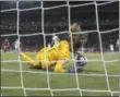  ?? ALESSANDRA TARANTINO ?? United States goalkeeper Alyssa Naeher saves a penalty shot taken by England’s Steph Houghton.