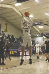  ?? The Sentinel-Record/James Leigh ?? GOING UP: Fountain Lake’s Landin Kizer (35) puts up a shot during Friday’s game against Nashville at Irvin J. Bass Gymnasium.