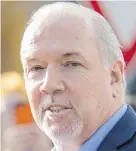  ??  ?? Premier John Horgan says that during his first time as MLA, “I got zero response from the government.”