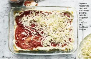  ?? DAVID MALOSH NYT ?? Layers of mozzarella, marinara and ricotta give this polenta lasagna all the comforts ofa traditiona­l lasagna.