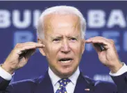  ?? Andrew Harnik / Associated Press ?? Joe Biden is leading in the polls over President Trump in several key battlegrou­nd states.