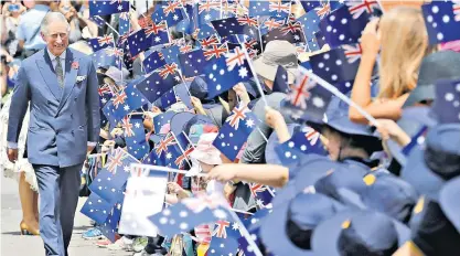  ?? ?? The King, then Prince Charles, is greeted by enthusiast­ic crowds in Adelaide during a 2012 visit to Australia