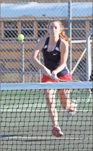  ?? Scott Herpst ?? Heritage No. 1 singles player, Morgan Phillips, rushes the net during a match at Ridgeland last week.