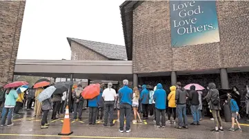  ?? MORRY GASH/AP ?? Churchgoer­s participat­e in a procession Sept. 12 at the Holy Apostles Church in Milwaukee. For decades, Roman Catholic voters have been a pivotal swing vote in U.S. presidenti­al elections, with a majority backing the winner, nearly every time.