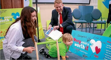  ??  ?? Education Minister Chris Hipkins is delivered a petition from over 8000 calling for more ECE funding.