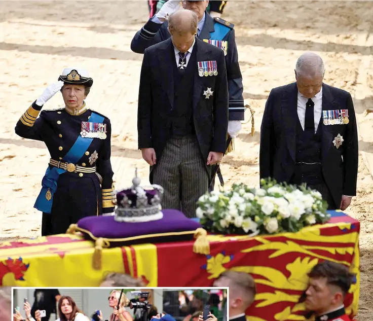  ?? ?? Family: King Charles, Prince William and Princess Anne salute the Queen’s coffin as Prince Andrew and Prince Harry bow their heads