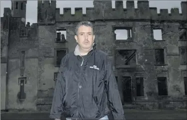  ??  ?? Tim Kelly ,founder of Irish Ghost Hunters , at Ducketts Grove Castle in Carlow.