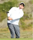  ?? AFP ?? Ted Potter Jr plays his shot on the eighth hole during the third round.