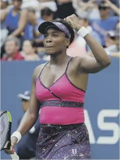 ??  ?? 0 Venus Williams celebrates after defeating Camila Giorgi.