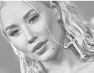  ?? AXELLE/BAUER-GRIFFIN/FILMMAGIC ?? Iggy Azalea's latest record, “In My Defense,” was released Friday.