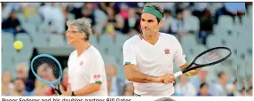  ?? —AP ?? Roger Federer and his doubles partner Bill Gates, software developer and philanthro­pist, in action against Rafael Nadal and Trevor Noah.