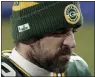  ?? MORRY GASH — THE ASSOCIATED PRESS ?? Packers quarterbac­k Aaron Rodgers walks off the field after the NFC championsh­ip game against the Tampa Bay Buccaneers in Green Bay, Wis., on Sunday.
