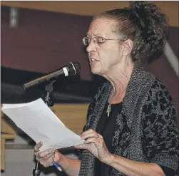  ??  ?? Linda Cosgrove of Hebron speaks about air quality concerns during a public meeting on Tuesday, September 16, 2014 at Hebron High School