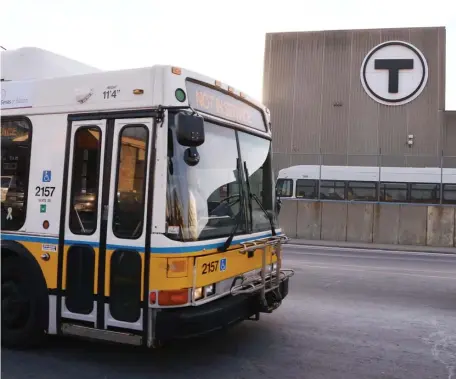  ?? HERALD STAFF FILE ?? ROOM OF THEIR OWN: An MBTA bus passes a service facility. Dedicated bus lanes will be set up in Boston, Somerville, Malden, Brookline, Revere and Lynn to improve travel times.