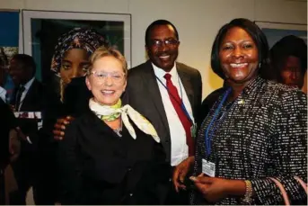  ??  ?? Finance Minister Honourable Margaret Mwanakatwe (left) share light moment with World Bank Country Manager Ina Marie Ruthenburg (left) as Secretary to the Treasury Fredson Yamba (middle) looks on.