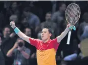  ?? AFP ?? Kei Nishikori reacts after beating Roger Federer at the ATP Finals in London.