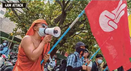  ?? AFP PIC ?? A Buddhist monk taking part in a demonstrat­ion against the military coup in Mandalay, Myanmar, recently.