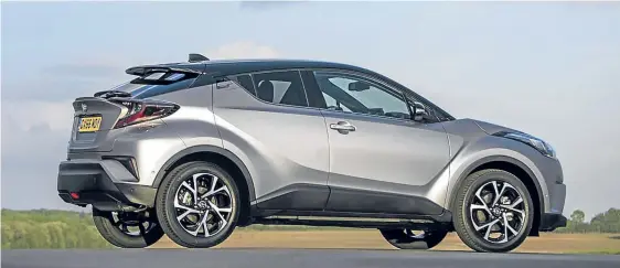  ??  ?? Toyota’s C-HR offers stylish looks in addition to the efficiency that comes with a hybrid.