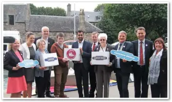  ?? LEVENMOUTH RAIL CAMPAIGN. ?? Levenmouth rail campaigner­s present their petition to Scottish Transport Minister Humza Yousaf.