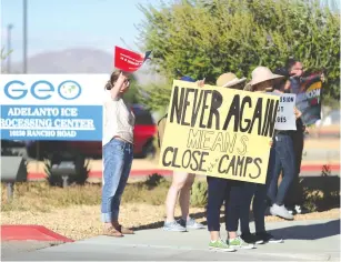  ?? (Lucy Nicholson/Reuters) ?? PROTESTERS DEMONSTRAT­E outside the ICE immigratio­n detention center in Adelanto, California, last month.