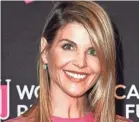  ?? FRAZER HARRISON/GETTY IMAGES ?? Lori Loughlin was greeted by cheers.